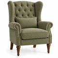 Sillón tapizado con botones decorativos y respaldo alto, verde y marrón